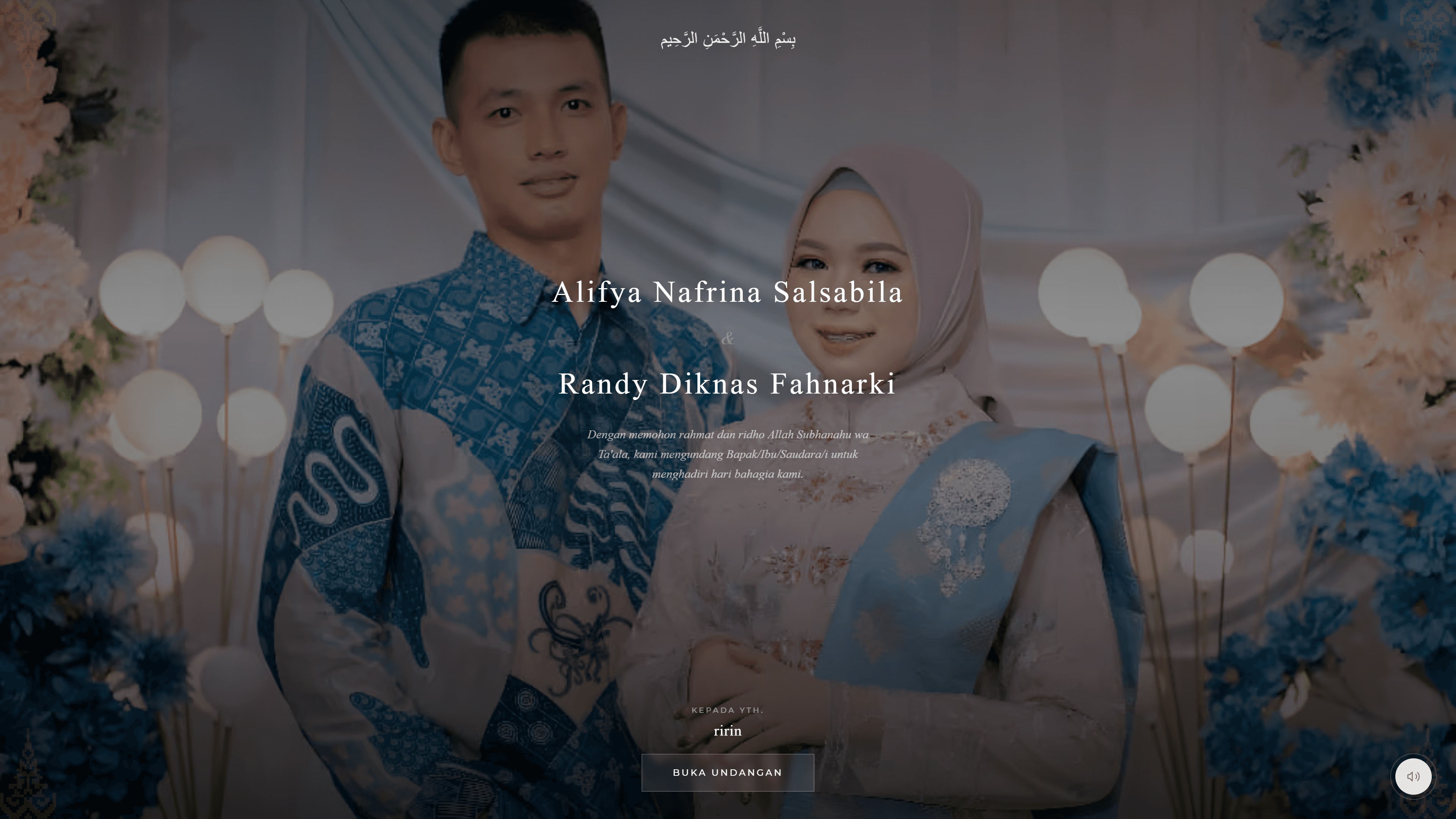 Digital wedding invitation opening screen: a full-bleed couple photograph behind a centred Arabic blessing, the couple's names in a serif face, an Indonesian invitation line, a personalised guest greeting, an Open Invitation button, and a floating audio toggle.